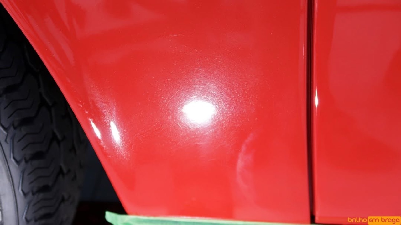 Red classic Porsche 911T, rear, after conservation and detailing.